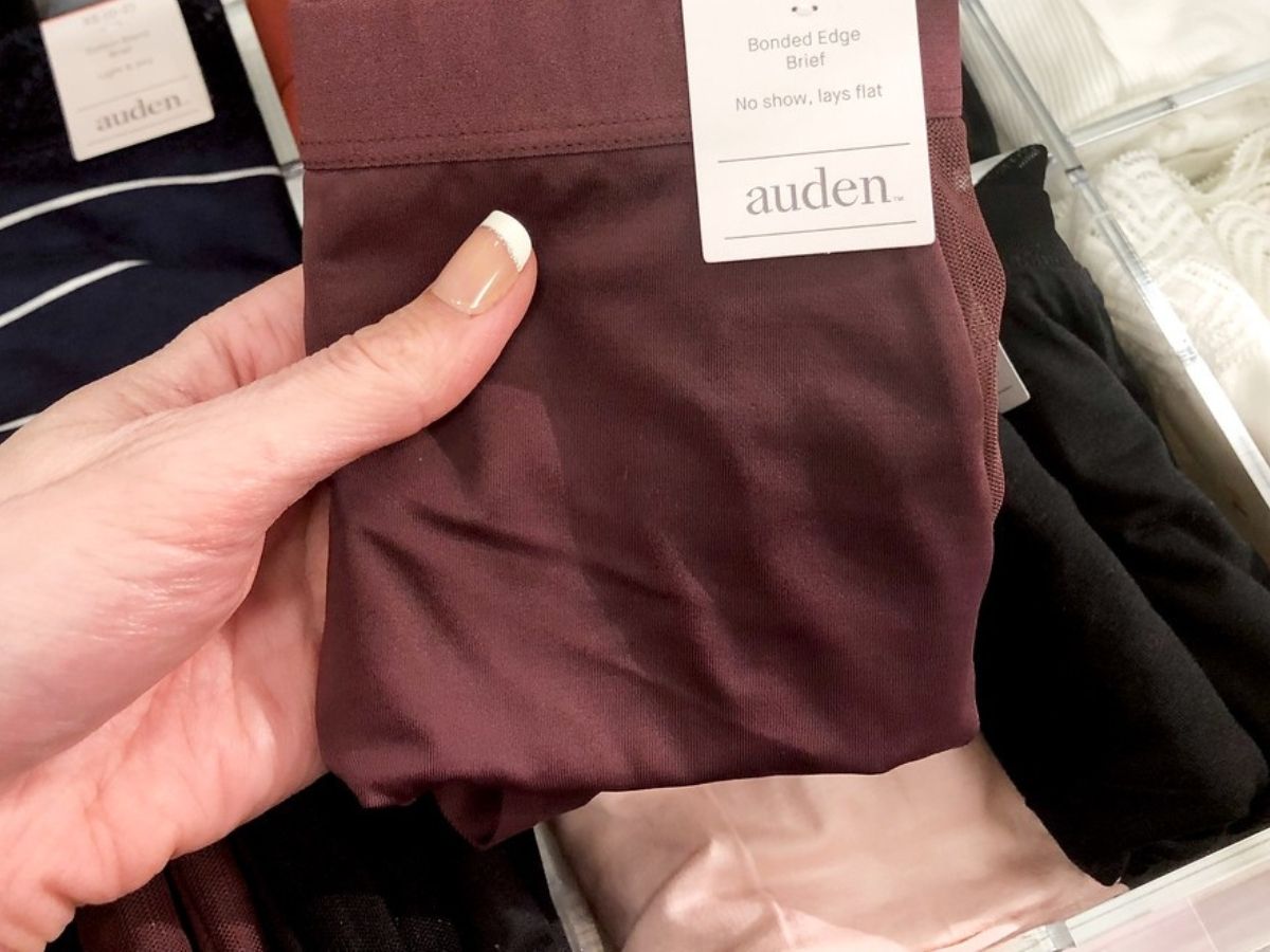 Woman's hand holding Auden women's Panties at Target