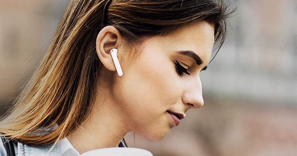 woman wearing earbuds