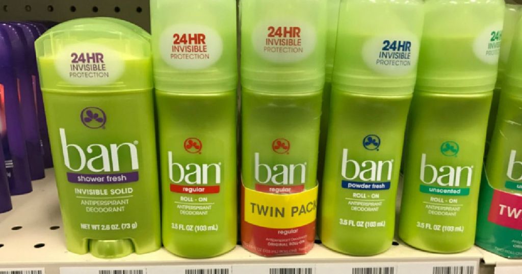 green deodorant bottles on shelf