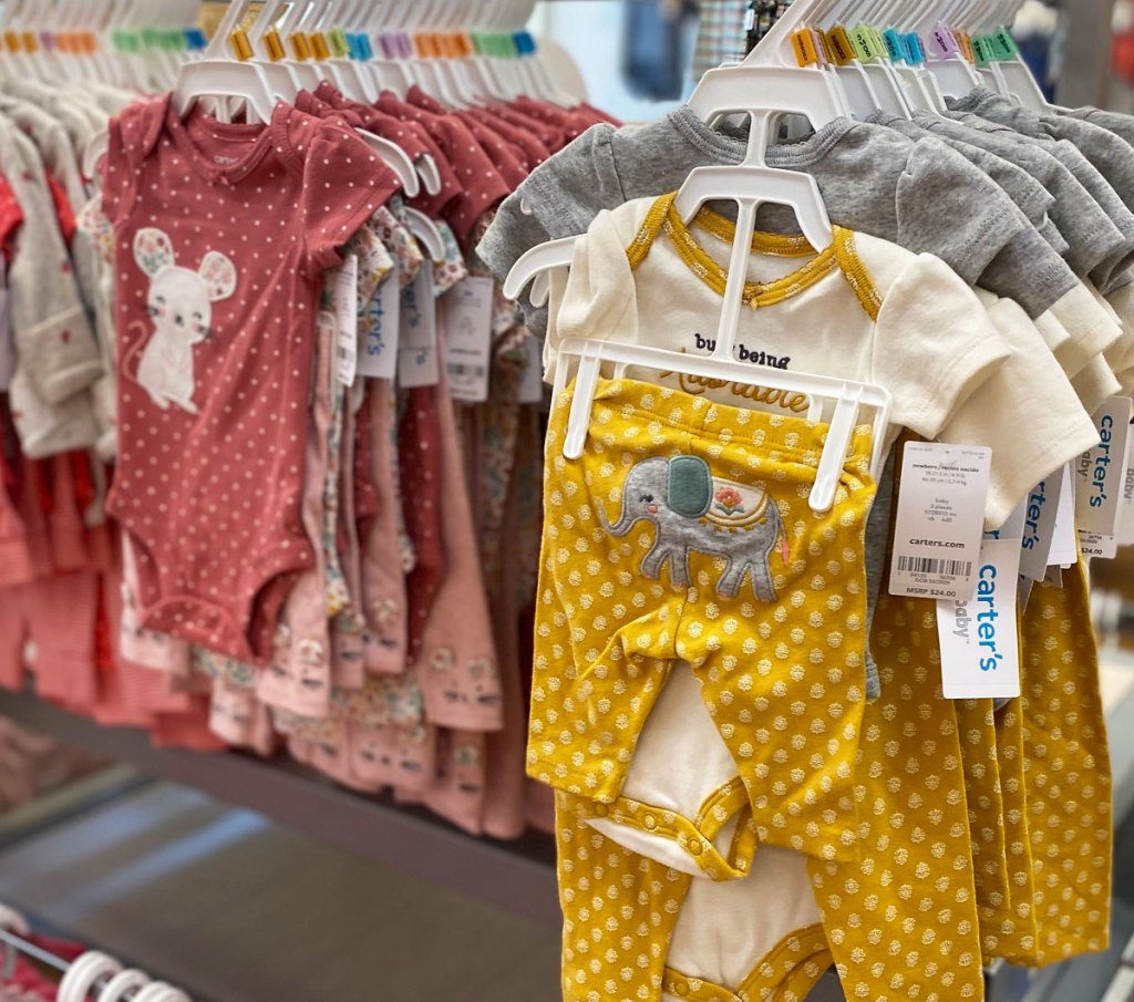 carters girls outfit sets on display at store