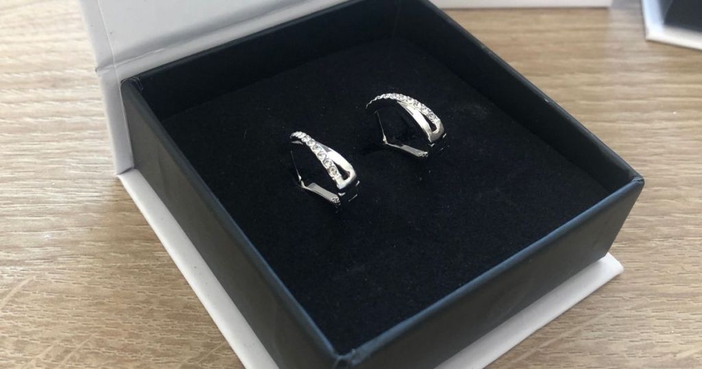 pair of earrings in a jewelry box