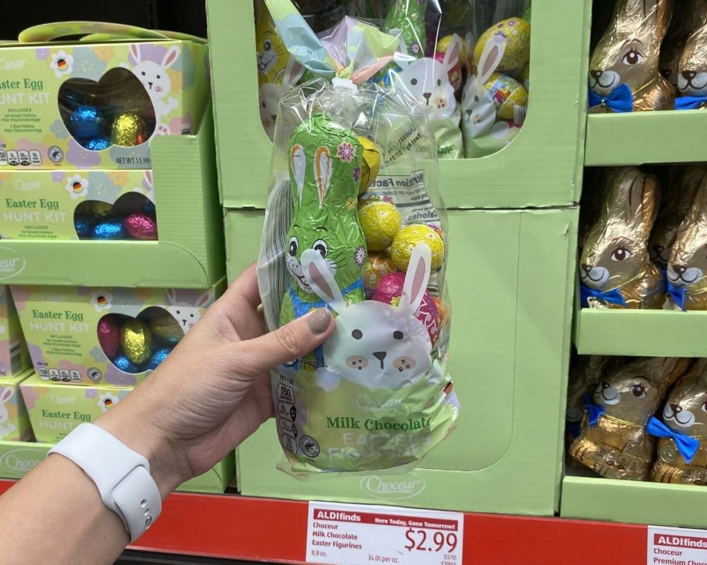 hand holding Choceur Easter Figures in store