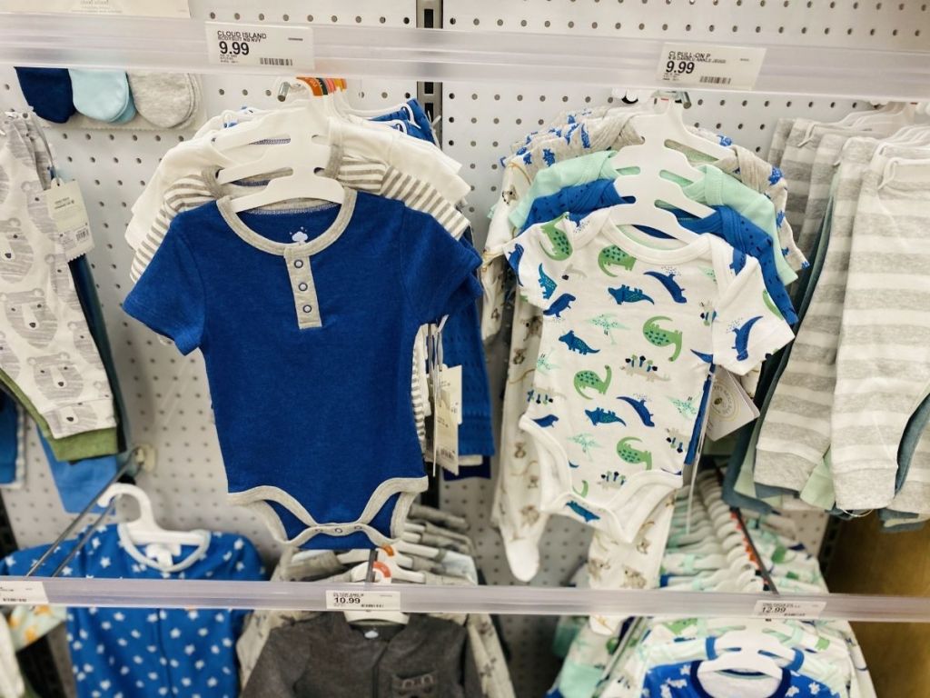 baby bodysuits on rack