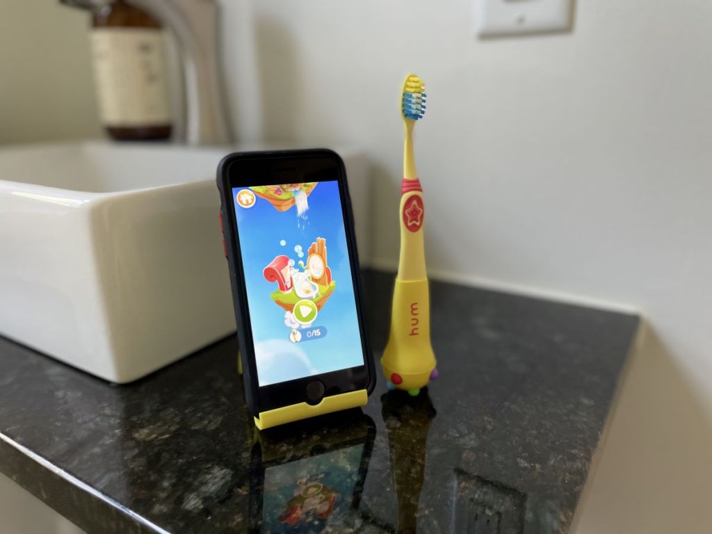 toothbrush next to a phone