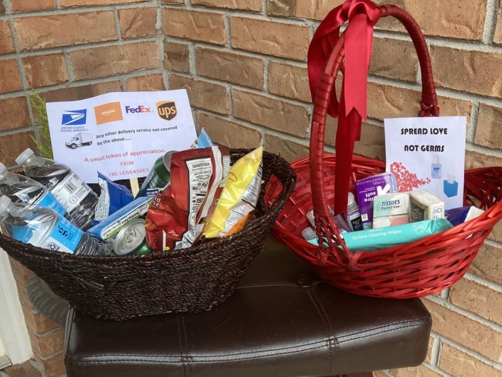 Baskets with snacks, bottled water and germ reducing health care products