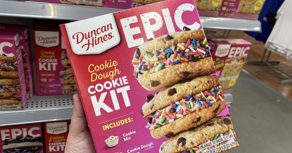 hand holding Duncan Hines EPIC Cookie Dough Cookie Kit in store