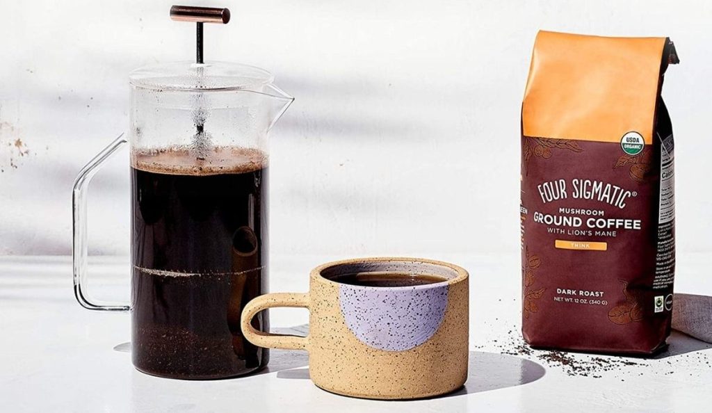 Four Sigmatic Coffee with cup and french press