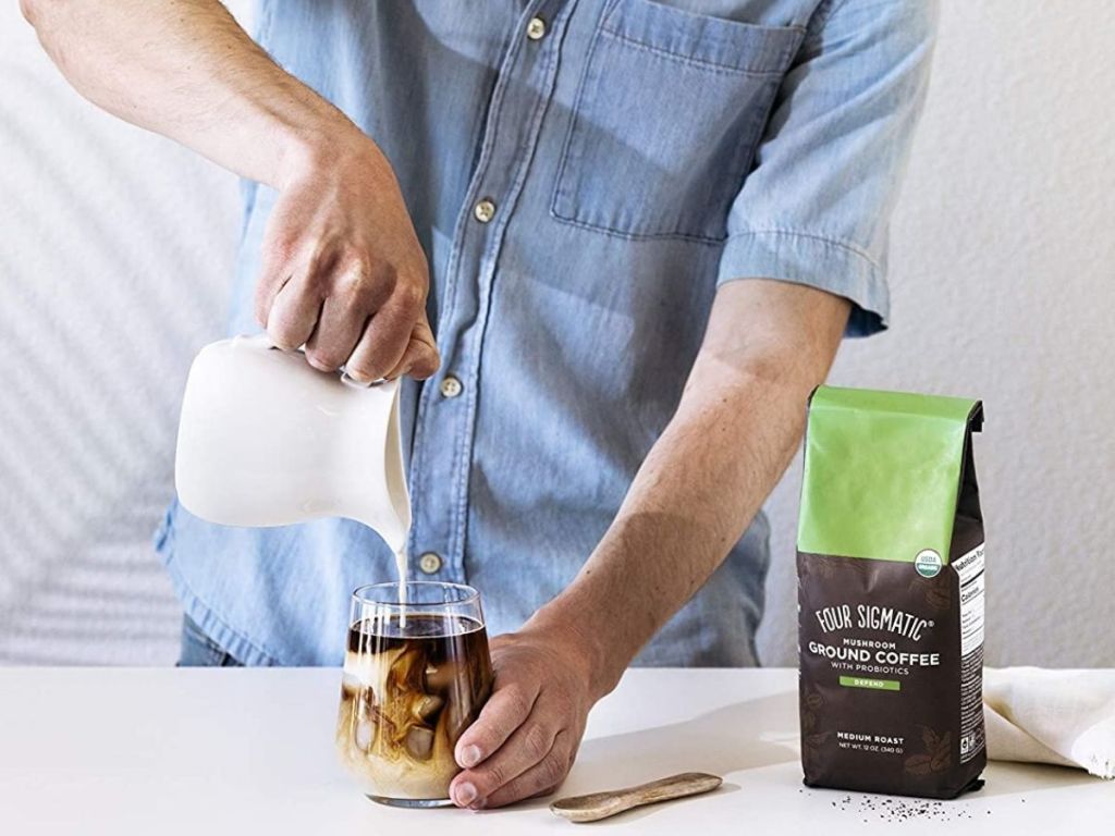 Man making cold brew with Four Sigmatic Ground Coffee