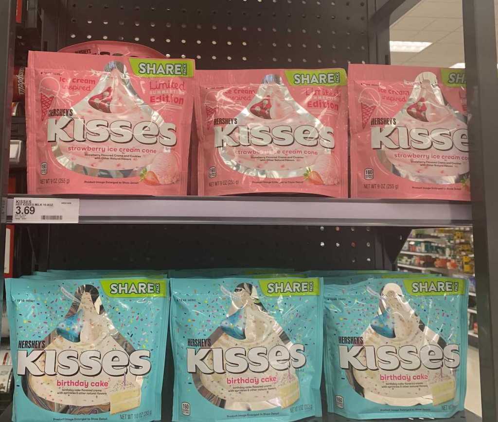 Hershey Kisses Flavored Share Bags on endcap shelf of store