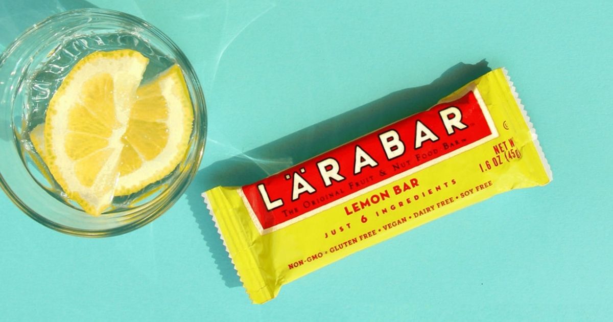 Larabar Lemon Bar next to a cup with lemons in it