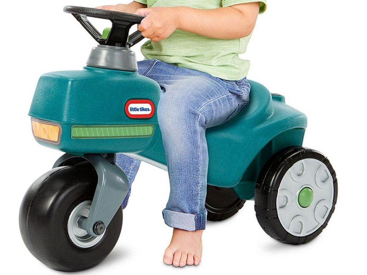 child riding Little Tikes Go Green Tractor