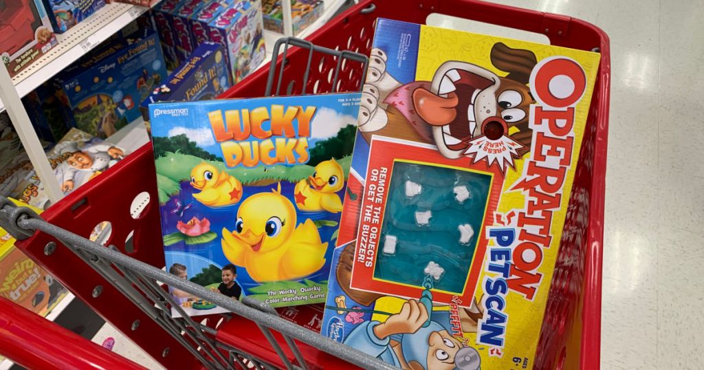two board games in red cart 