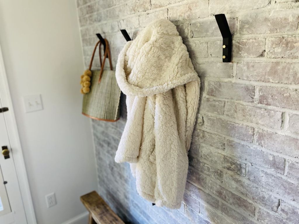 sherpa hanging on a coat hook