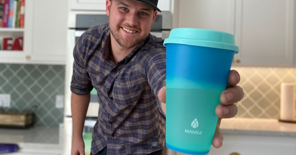Man holding a color changing Tumbler cup
