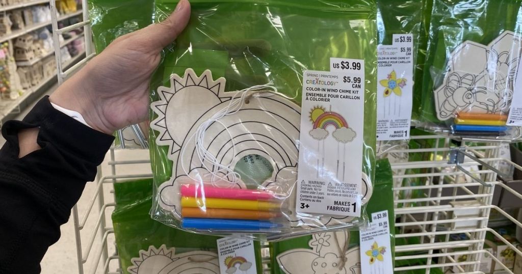 hand showing Michaels Kids Craft Kits in store
