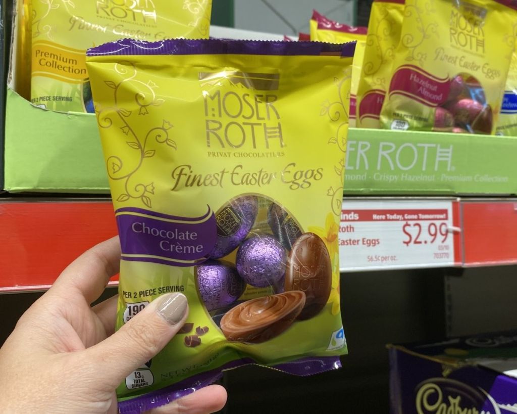 hand holding Moser Roth Finest Easter Eggs in store