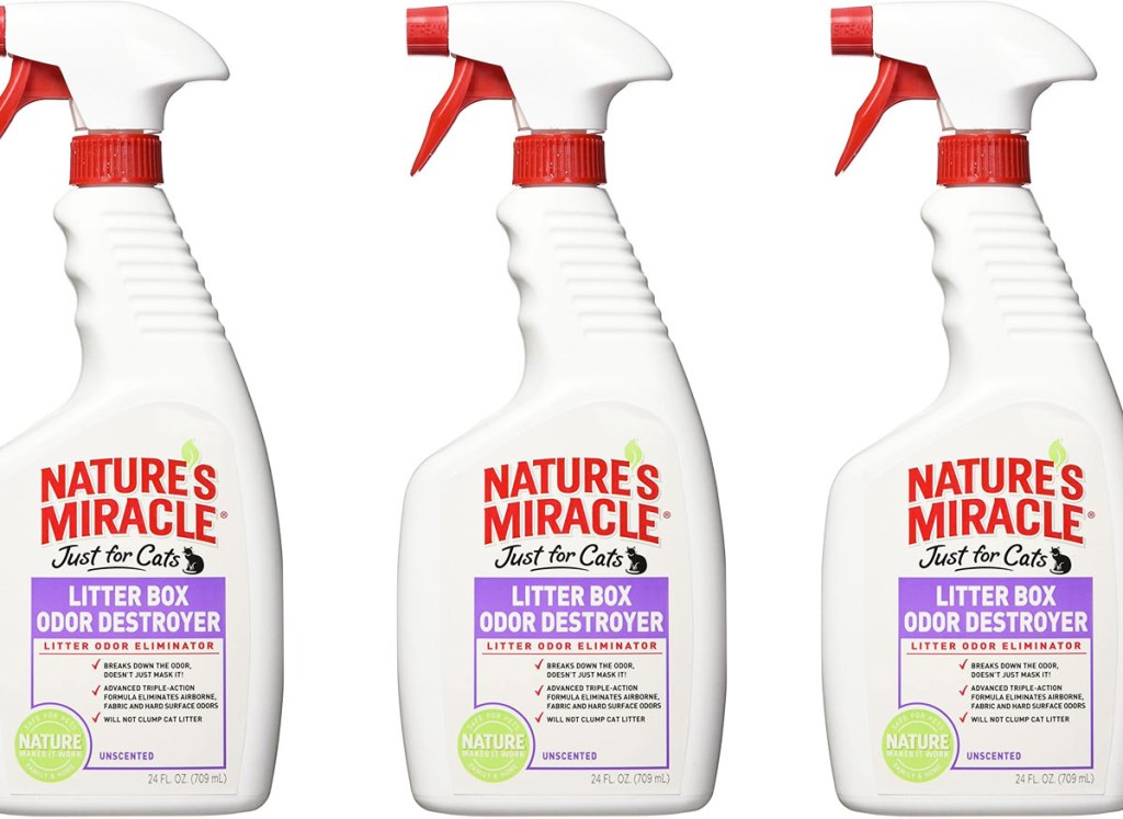 three white spray bottles of nature's miracle little box spray