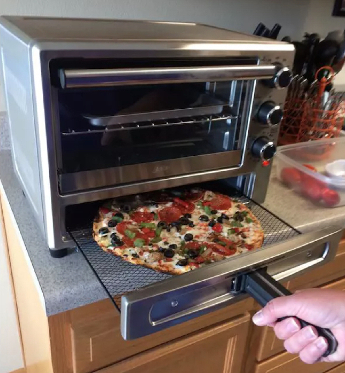 Toaster oven with top pizza drawer