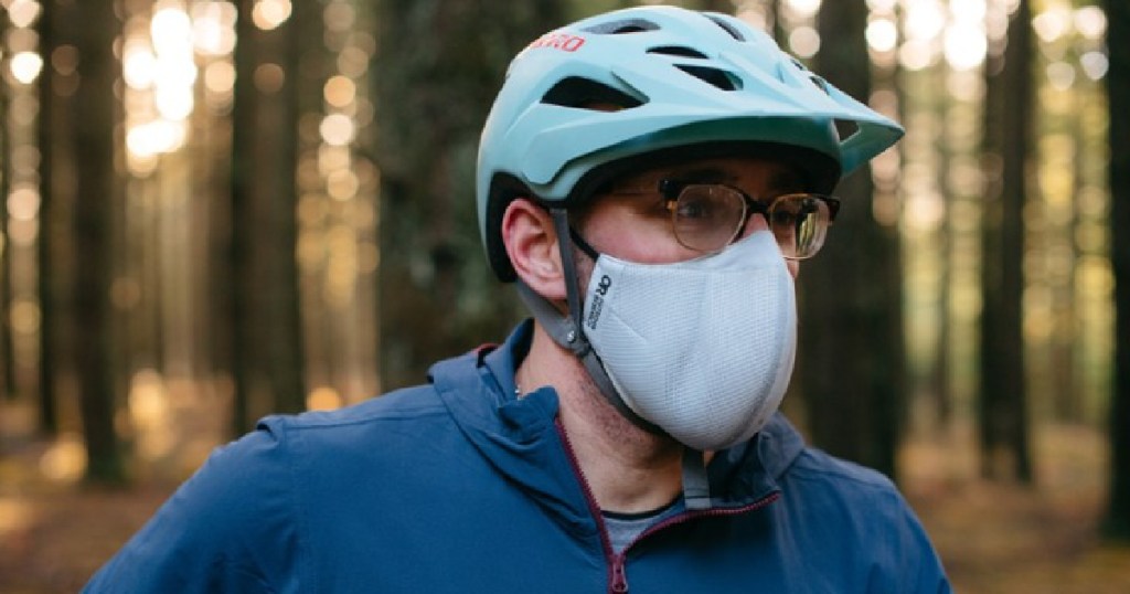 Outdoor Research Adrenaline Sports Face Mask on man biking