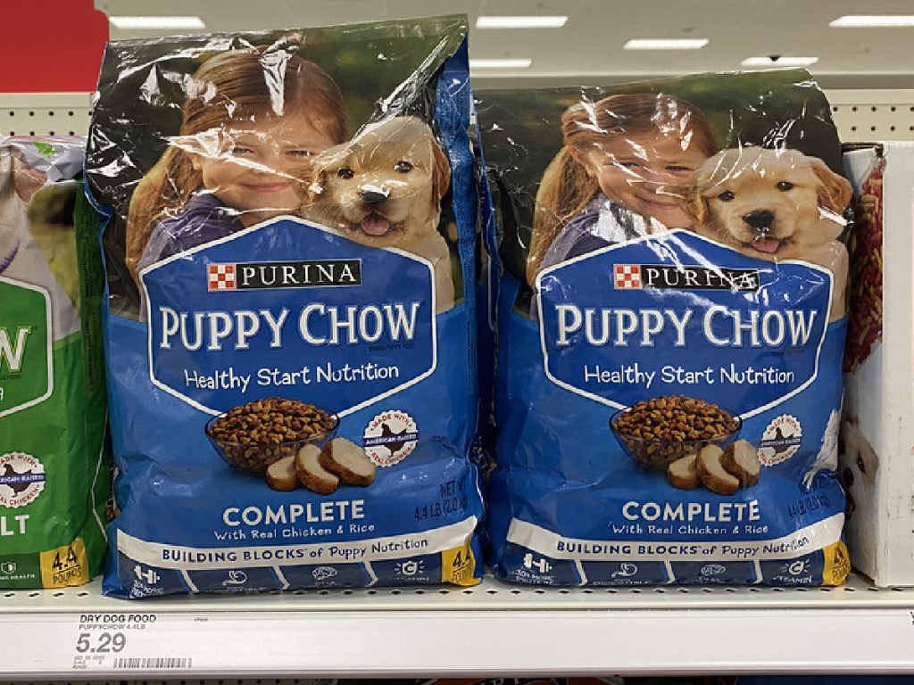 bags of dry puppy food on store shelf