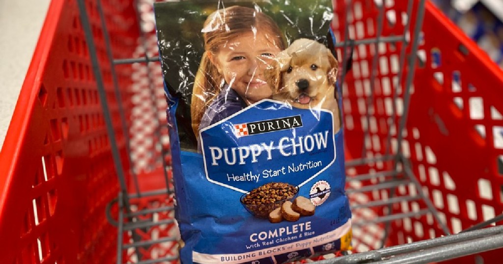 bag of dry puppy food in store cart