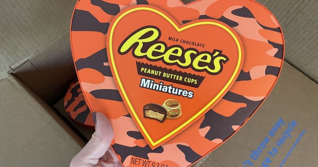 hand holding Reese's PB Cups Heart Box