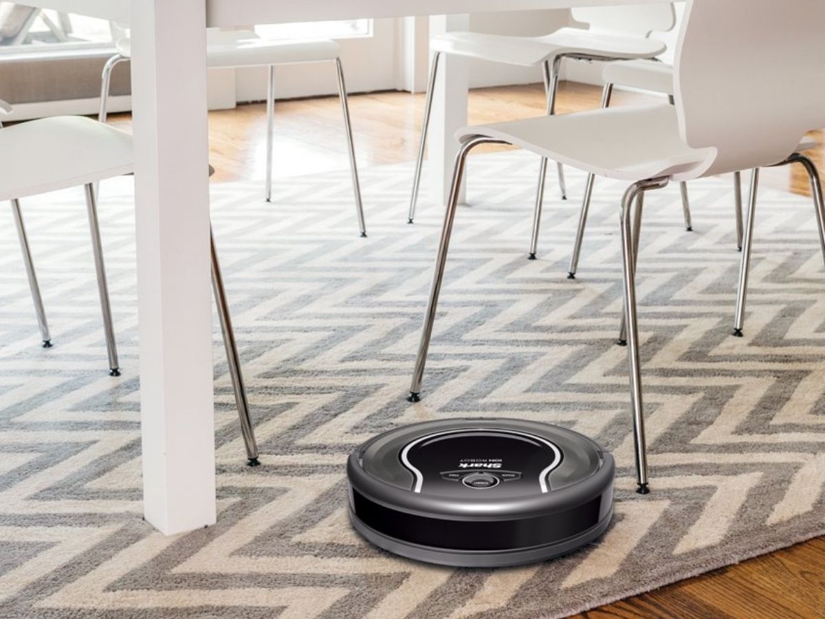 robot vacuum under a table