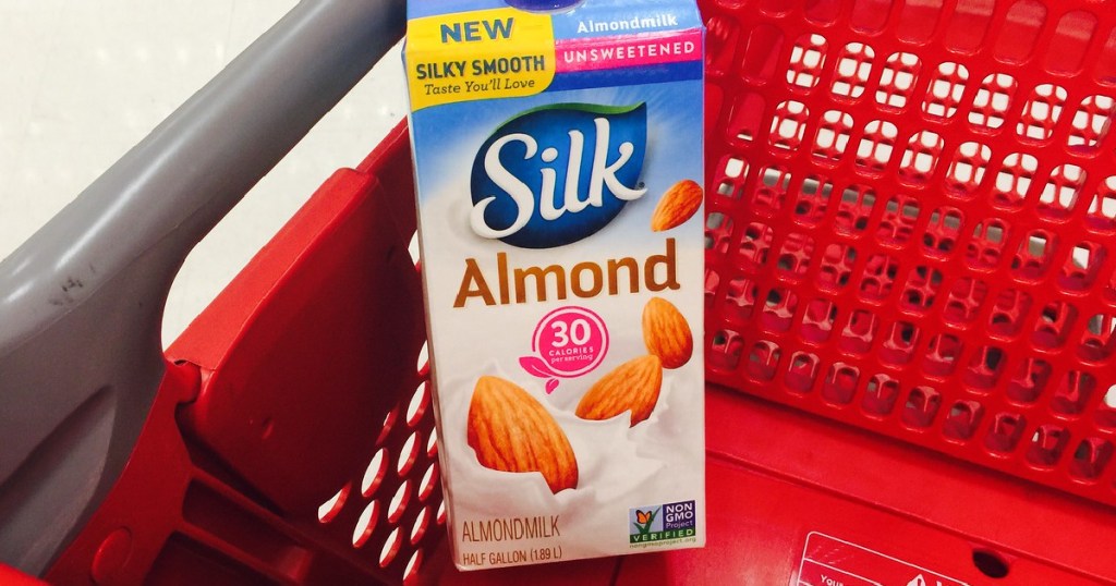 carton of almond milk in store cart