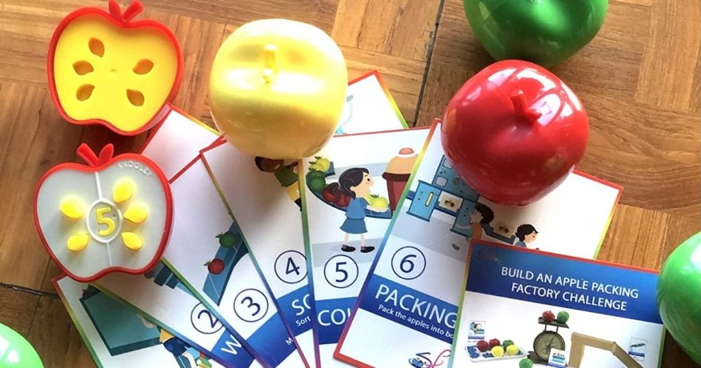 toy apples and notecards