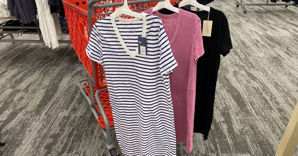 dresses hanging on a Target cart