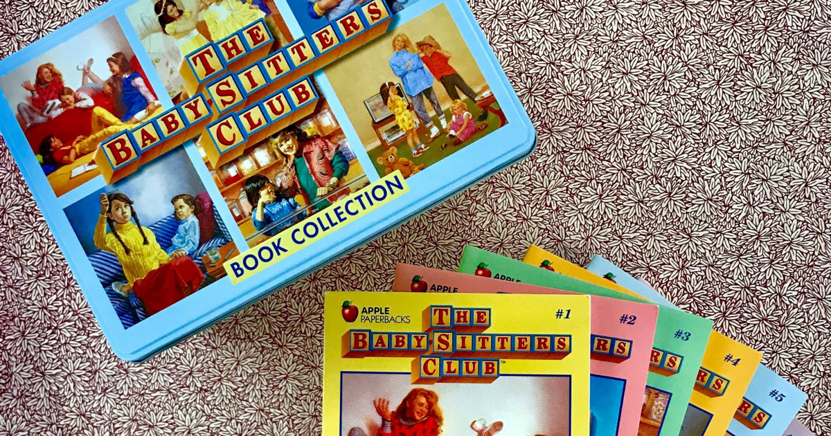 The Baby-Sitters Club Retro Book Set with books and tin spread out on a rug