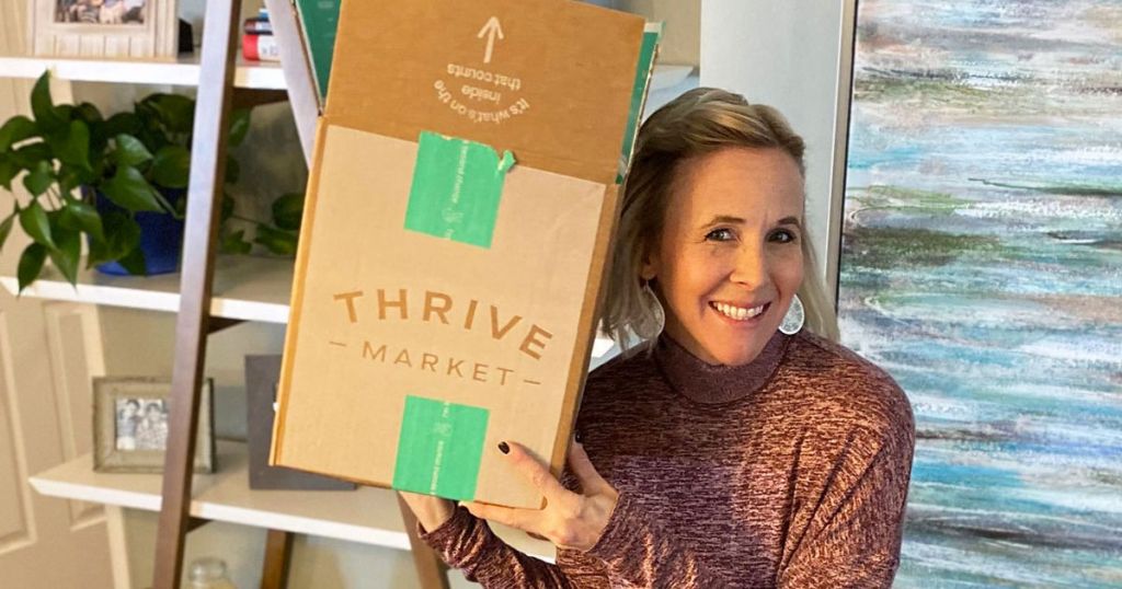 woman holding box from Thrive Market