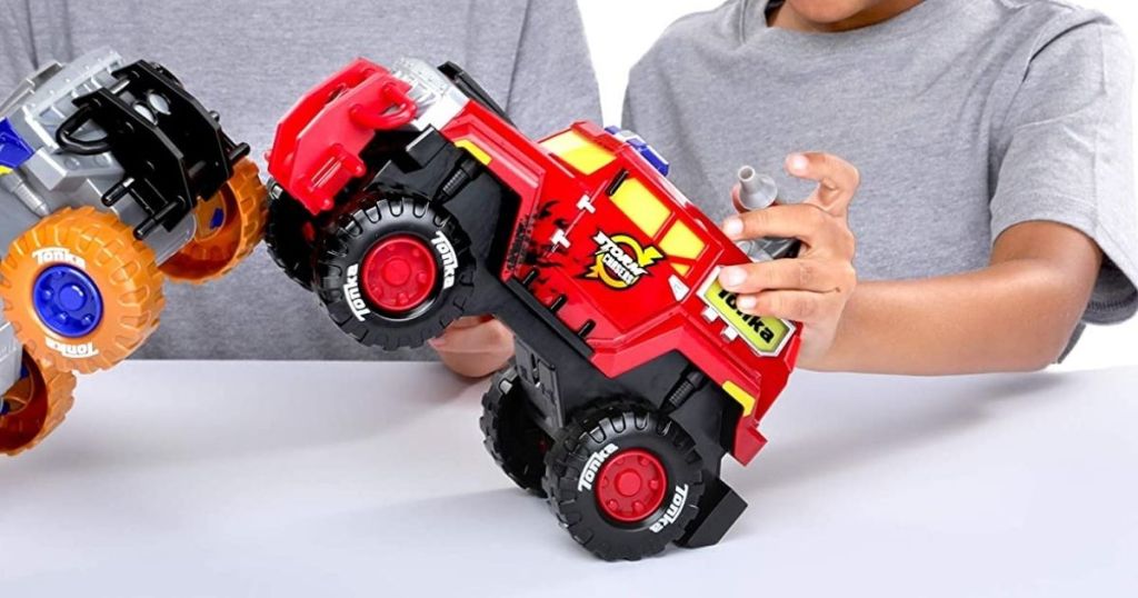 kids playing with toy truck