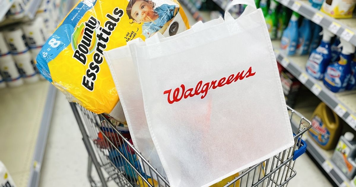 walgreens bag in cart with paper towels behind it