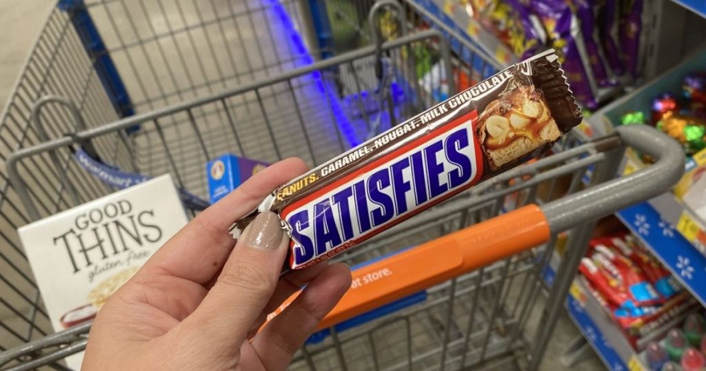 hand holding snickers and good thins crackers Walmart Freebies
