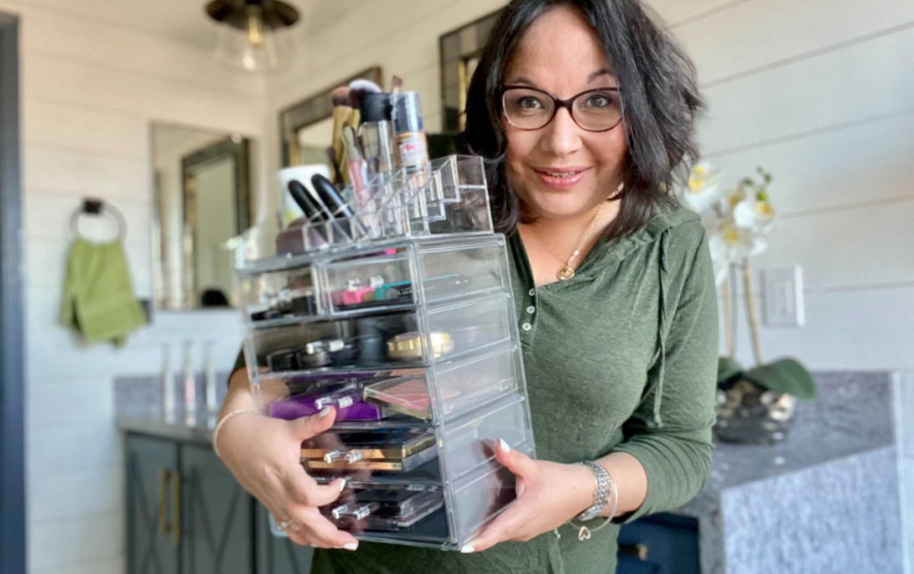 Woman holding Sorbus Makeup Organizer with Drawers