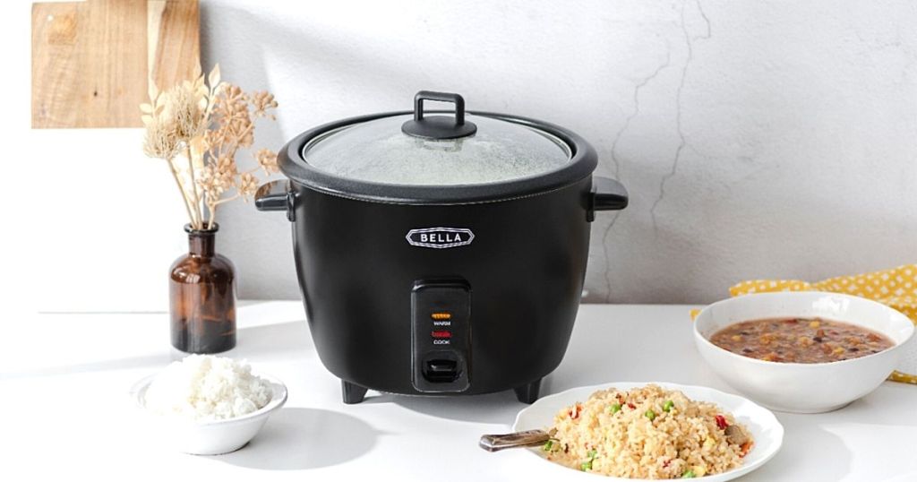 Bella rice cooker with rice dishes on counter