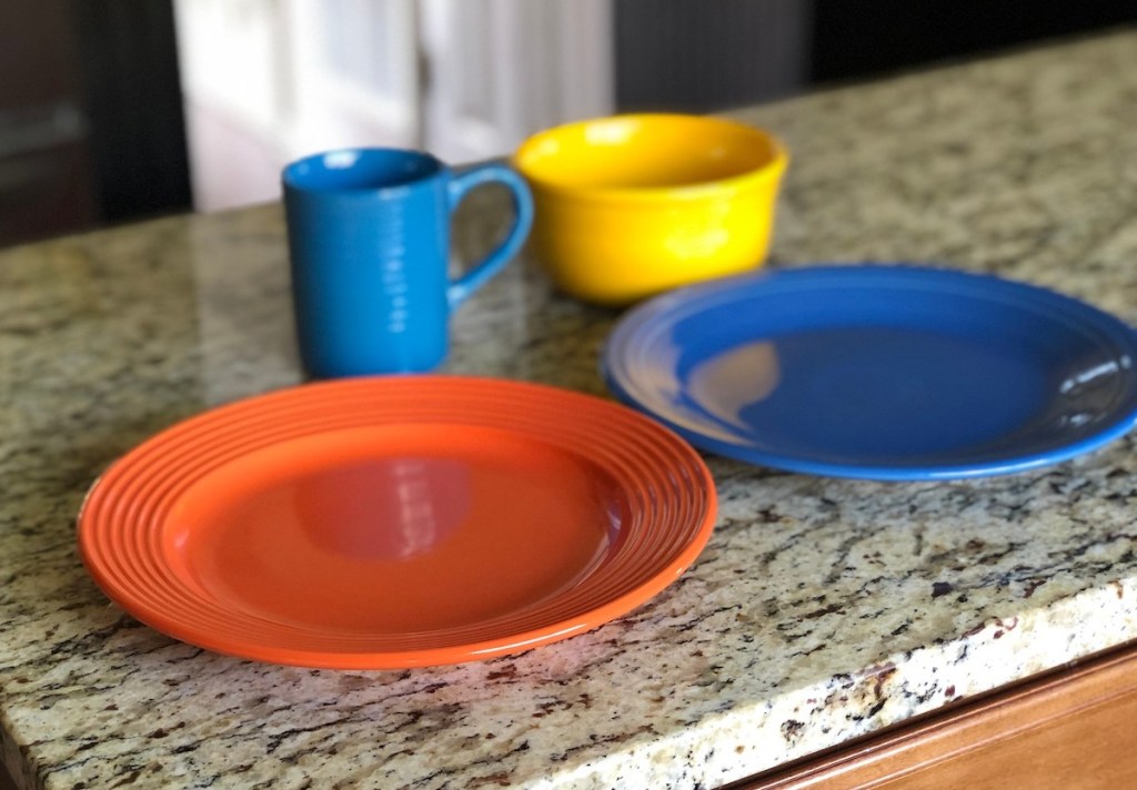 colorful dishes on granite countertop