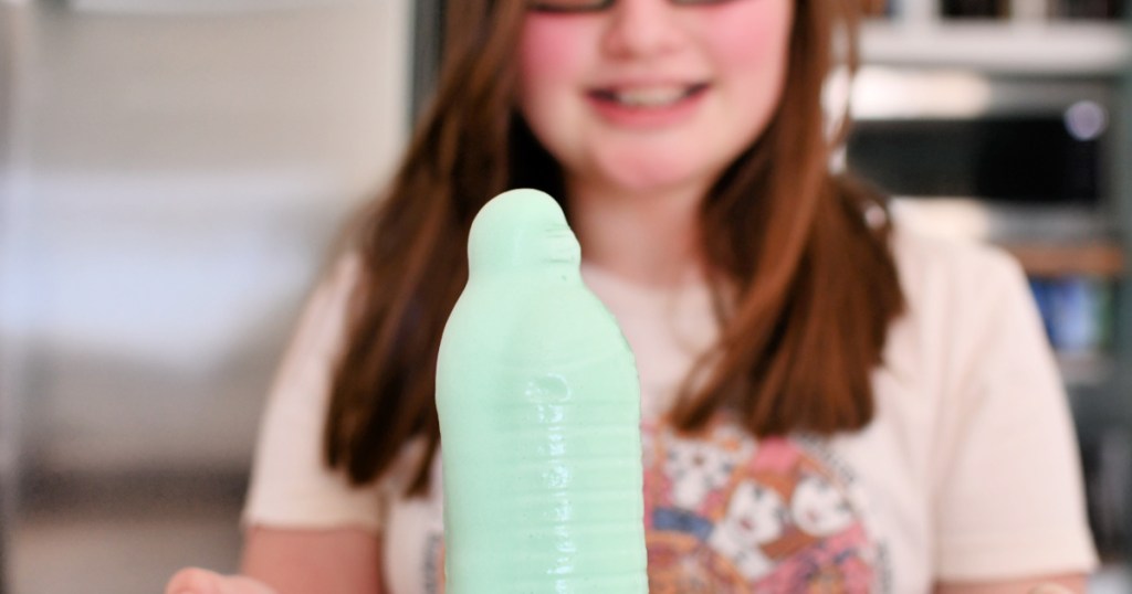 elephant toothpaste in a water bottle