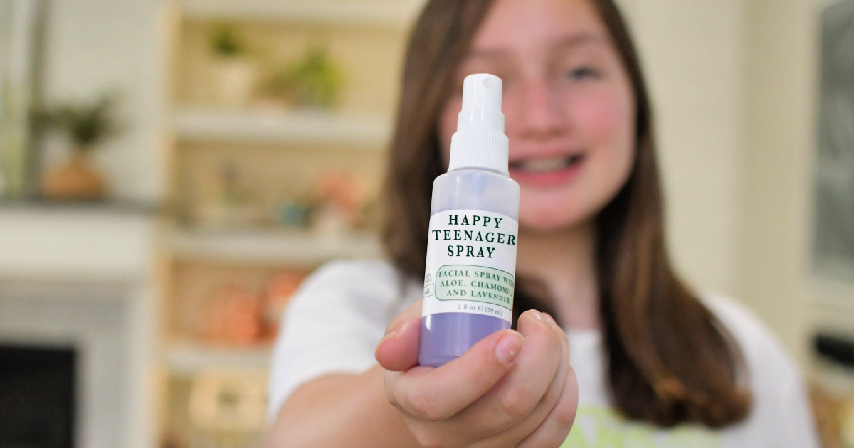 happy teen spray face spray april fools prank