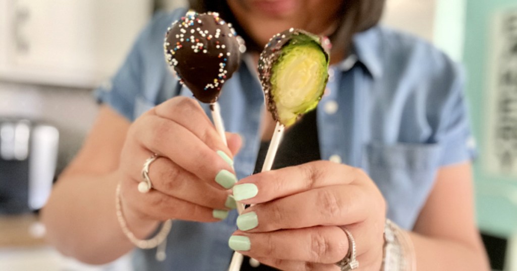 holding a brussels sprout cake pop april fools prank
