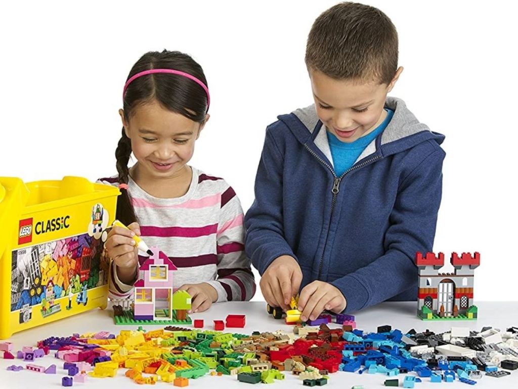 girl and boy playing with LEGO Classic set