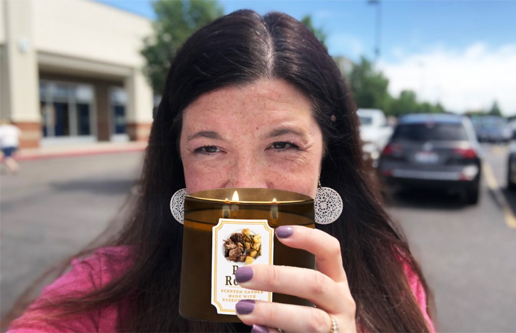 woman smelling pot roast candle