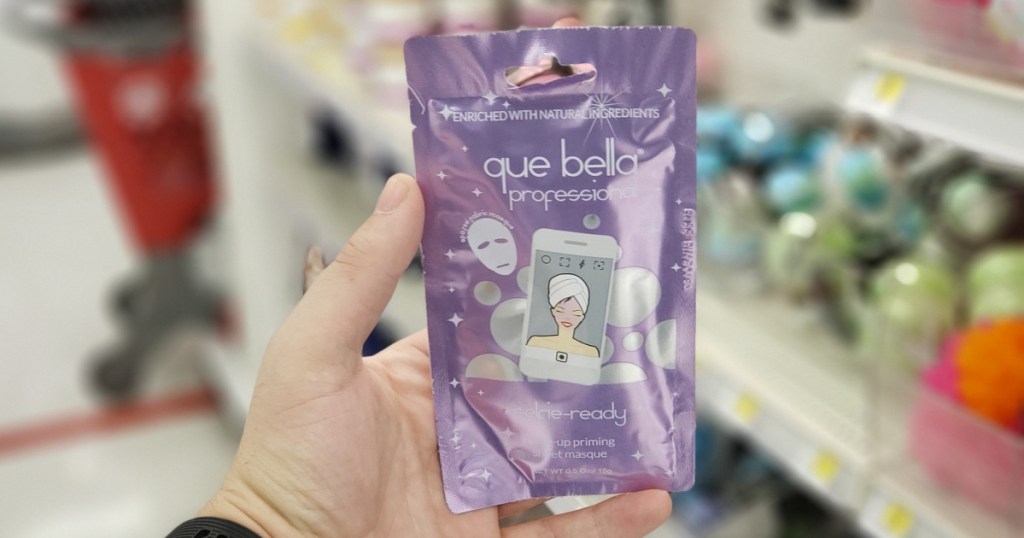 que bella face mask in hand in store