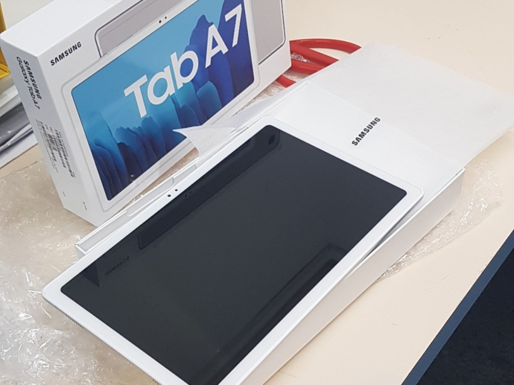 Samsung tablet next to box
