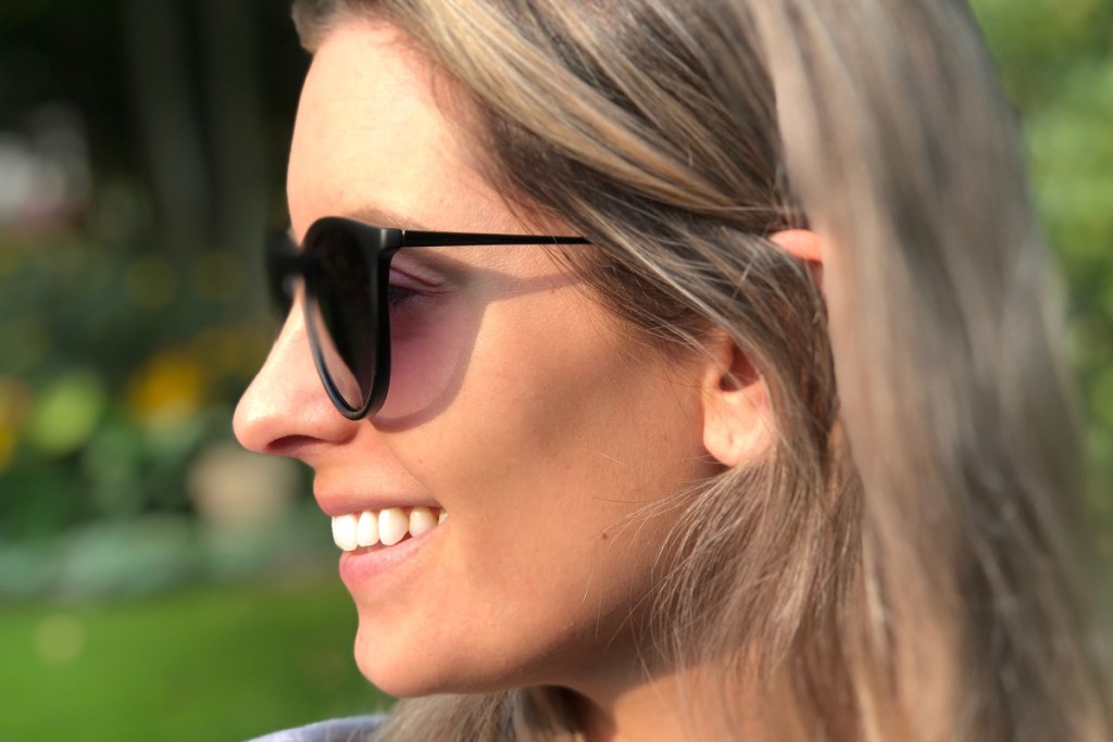 sungait black retro sunglasses on woman facing sideways