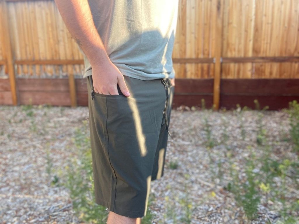 man wearing green shorts