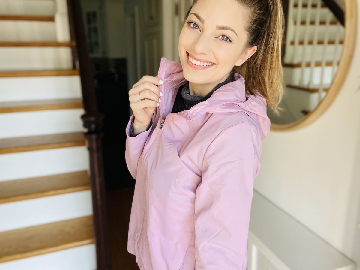 woman wearing pink windbreaker