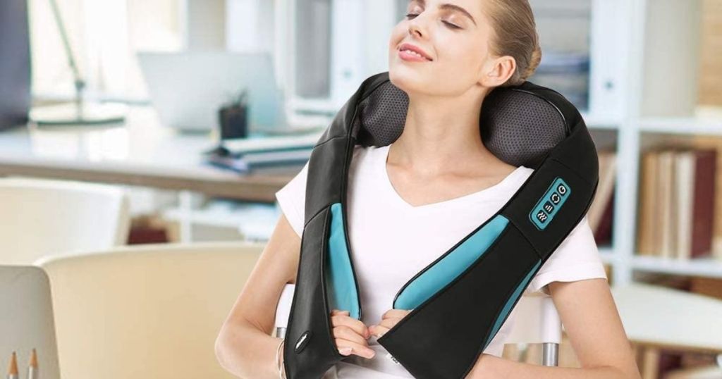 woman using a neck massager
