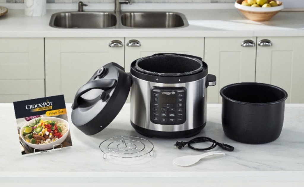 crock pot multi cooker on counter with accessories